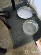 картинка 1 прикреплена к отзыву Large Non-Slip Waterproof Dog Food And Water Bowl Mat, 24" X 16", Easy To Clean Pet Feeding Mat With Unique Star Pattern от Tony Watts
