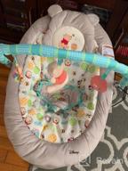 img 1 attached to MICKEY MOUSE Comfy Disney Baby Bouncer In Cloudscapes Includes Bar With 3 Cute, Plays 7 Soothing Melodies W/Auto Shut-Off, Age 0-6 Months review by Samuel Kromah