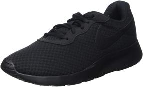 img 4 attached to NIKE Womens Tanjun Black White Women's Shoes : Athletic