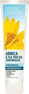 desert essence arnica organic toothpaste logo