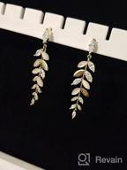 img 1 attached to Dazzling 14K Gold Plated Olive Branch 🌿 Leaf Earrings with Cubic Zirconia & Cat Eye Embellishments review by Billy Reeves