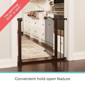 img 1 attached to 🚪 North States Toddleroo 40.5" Wide Stone Arch Auto Close Baby Gate: Self-Closing Barrier with Hold-Open Feature. Pressure Mount with a Fit for Openings from 29.75” to 40.5” Wide (31" Tall, Bronze)