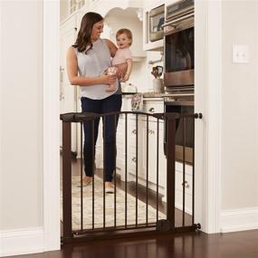 img 4 attached to 🚪 North States Toddleroo 40.5" Wide Stone Arch Auto Close Baby Gate: Self-Closing Barrier with Hold-Open Feature. Pressure Mount with a Fit for Openings from 29.75” to 40.5” Wide (31" Tall, Bronze)