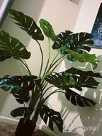 img 1 attached to Artificial Swiss Cheese Plant - 4Ft Tall Monstera Deliciosa With 15 Split Leaves - Faux Tropical Monstera Palm Tree For Home, Office, Store, Garden Floor Decor - Set Of 2 review by Timothy Richmond