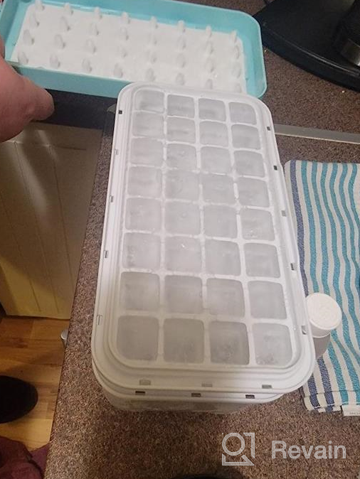 img 1 attached to HMASYO Silicone Ice Cube Tray With Lid And Bin - Release 64 Cubes Easily, Stackable Design For Convenient Storage, Perfect For Chilling Drinks! review by Trey Crosland