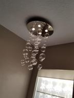 картинка 1 прикреплена к отзыву Современная стеклянная люстра Saint Mossi с эффектом капель дождя, освещение на потолок с LED-лампами, подвесной светильник для столовой, ванной комнаты, спальни, гостиной. Требуются 4 лампы GU10. Размеры: H31 X D20. от Andrew Vogel