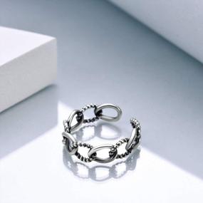 img 2 attached to Регулируемое открытое кольцо ONEFINITY: универсальный дизайн в виде креста и змеи для женщин