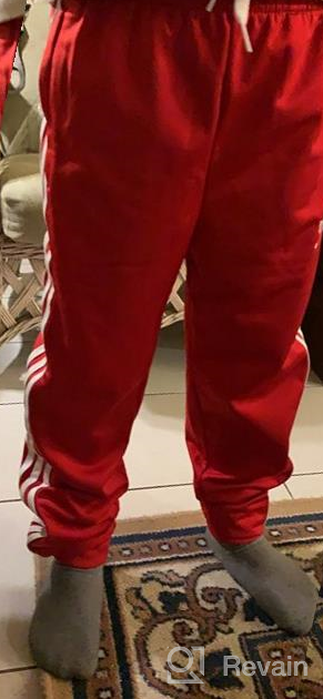 img 1 attached to 👖 Stylish and Versatile: adidas Originals Unisex-Youth SST Track Pants review by Brenda Black