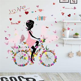 img 1 attached to 🌸 Colorful Loving Hearts Flowers & Butterflies Girl Riding Bicycle Butterfly Wall Decal - Peel and Stick Removable Flower Fairy Wall Stickers Mural for Girls Nursery Bedroom Living Room