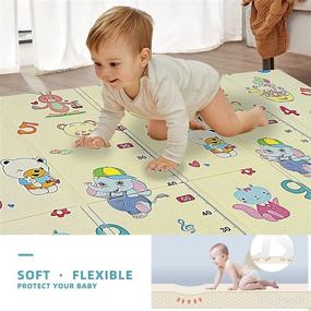 img 2 attached to 👶 Large Folding Non-Toxic Foam Baby Play Mat - Waterproof 0.6 in Reversible Crawling Mat for Floor, Indoor Outdoor Use - Animal Train Design for Infants and Toddlers