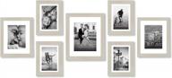 americanflat 7 pack light wood gallery wall set displays one 11x14, two 8x10, and four 5x7 inch photos. shatter-resistant glass. hanging hardware included! логотип