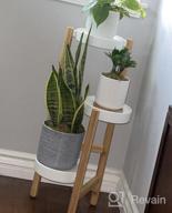 картинка 1 прикреплена к отзыву 3 Tier Bamboo Plant Stand - Elegant Corner Display Holder For Indoor And Outdoor Garden, Home Decor And Plant Display Rack (3 Tier - 1) от Kevin Swier