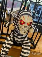 img 1 attached to Halloween Animatronic Talking Prisoner Decoration With Motion Sensor And Light - Spooky Indoor/Outdoor Prop For Kids And Adults | Clearance Halloween Décor review by Dino Wilson