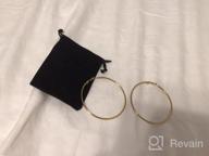img 1 attached to Dainty 70mm 14K Yellow Gold Silver Big Large Hoop Earrings: Stylish, Hypoallergenic, Perfect Gift for Women and Girls with Sensitive Ears review by Kristina Soucy
