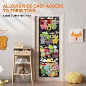 img 2 attached to 🧸 Stuffed Animals Storage Organizer by Tovve - Over the Door, Baby Accessories and Kids Toys Organizer with 4 Large Pockets for Kids Room, Bathroom, Nursery