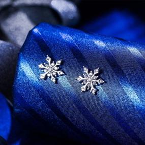 img 1 attached to Shimmering Winter Magic: EleQueen 925 Sterling Silver Snowflake Stud Earrings With Cubic Zirconia