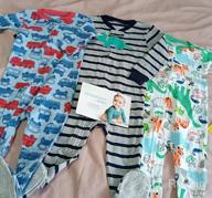 img 1 attached to 3-Pack Snug Fit Footed Cotton Pajamas for Boys by Simple Joys Carter's review by Robert Jackson