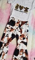 img 1 attached to Cute & Chic Cow Print Outfit Set For Toddler Girls: Long Sleeve T-Shirt + Bell-Bottom Pants In Tie Dye Leggings - 0-4T review by Alex Barnes