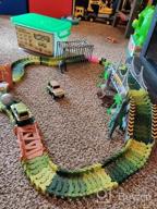 img 1 attached to 159 Pcs Dinosaur Glow In The Dark Race Train Track Toy For Boys & Girls Ages 3-7 | DinoManiacs By JitteryGit review by Leo Torres