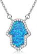 sterling silver hamsa hand pendant necklace with synthetic opal and cable chain - 16" length with 2" extender by kaletine logo