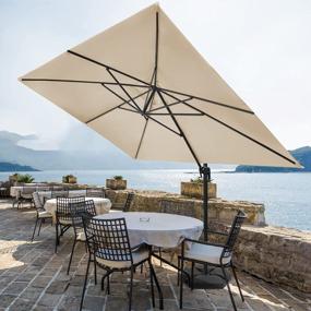 img 4 attached to Cantilever Patio Umbrella With 360° Rotation And Tilt - ASTEROUTDOOR'S 9X12.5 Ft. Aluminum Umbrella For Comfortable Outdoor Living