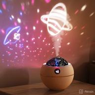 🌟 shuyuni 550ml portable small cool mist humidifiers with 6-color starry night light & 360° rotation projector - ideal for kids & baby bedroom, whisper-quiet operation, waterless auto-off, bpa free – perfect gift! логотип