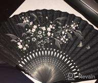 img 1 attached to Folding Hand Fan For Women - Chinese Japanese Vintage Bamboo Silk Foldable Hot Flash Church Decoration EDM Music Festival Dance Party Performance Gift (Sexy Black White) review by Todd Gill