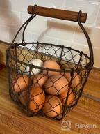 img 1 attached to Rusty Primitives Vintage Gathering Basket With Swing Handles - CVHOMEDECO Round Chicken Wire Egg Fruit Basket review by Heather Nelson