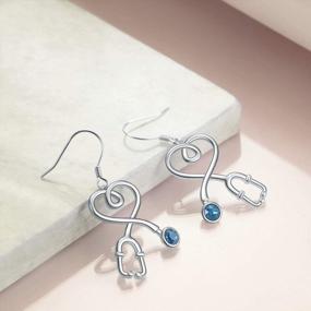 img 1 attached to AOBOCO Sterling Silver Nurse Earrings: Stethoscope Drop Design With Blue Crystal, Perfect Jewelry Gift For Doctors And Nurses - S925 Grade Fishhook Style