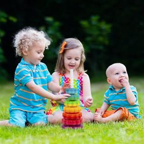 img 1 attached to 🌈 Rainbow Spinning Stacking Tower - Ollie & Olive Learn & Play - Educational Toy for Toddlers and Babies 12 Months+ - Promotes Hand-Eye Coordination - Gender-Neutral Learning Toy for Boys and Girls