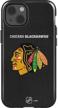 protect your iphone 14 with skinit impact case - officially licensed nhl chicago blackhawks distressed design logo