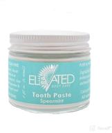 elevated taylors natural fluoride tooth logo