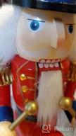 img 1 attached to Handmade Wooden Nutcracker With Flannel Ful Golden Coat - Festive Collectible For Christmas Decorations And Winter Tabletop Displays, FUNPENY 19" Santa Design review by Nathan Hutchinson