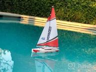 img 1 attached to RC-Controlled Blue Wind-Powered Sailboat: PLAYSTEAM Voyager 280 - 17.5" Tall review by Joe Vazquez