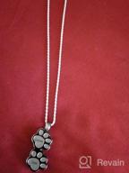 img 1 attached to Double Paw Print Urn Pendant – 🐾 Stainless Steel Cremation Jewelry for Ashes, Memorial Keepsake review by James Turpin