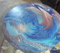 img 1 attached to Create Stunning Artwork With AUREUO'S High Flow Acrylic Pouring Paint Set - Includes 4 Colors And Silicone Oil For Vibrant Results On Canvas, Rock, Ceramic, Wood, Glass And More! review by Sam Bauer