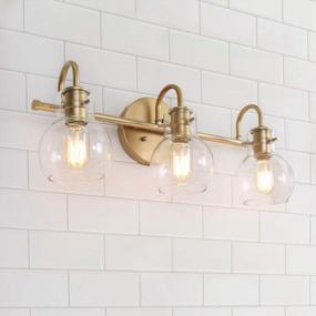 img 4 attached to Золотые светильники для ванной комнаты с 3 плафонами из прозрачного стекла, 22 x 7 x 9 дюймов - RUZINIU Светильники для ванной над зеркалом