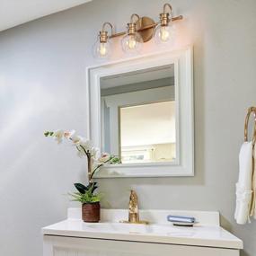 img 1 attached to Золотые светильники для ванной комнаты с 3 плафонами из прозрачного стекла, 22 x 7 x 9 дюймов - RUZINIU Светильники для ванной над зеркалом