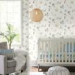 easy and adorable room transformation with disney winnie the pooh playmates peel and stick wallpaper in blue logo