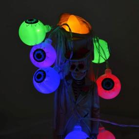 img 3 attached to Жутко и весело: осветите свой декор на Хэллоуин с помощью 30 светодиодных гирлянд для глаз ILLUMINEW - водонепроницаемые, 8 режимов, дистанционное управление и питание от батареек!