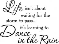 transform your walls with inspiring quotes: get the 'learning to dance in the rain' vinyl decal today! logo