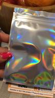 img 1 attached to Tufusiur 100 Pack: Resealable Smell Proof Holographic Bags - Perfect For Food Storage! review by Smokeythecryptkeeper Collars