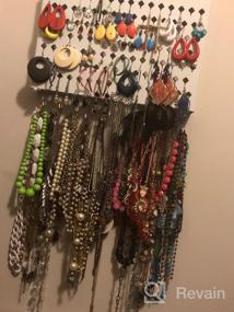 img 7 attached to Black Wall Mounted Jewelry Organizer With 117 Holes And 12 Hooks For Earrings, Necklaces, And Bracelets - Display Hanger By JackCubeDesign (16.54 X 12.2 X 0.75 Inches)