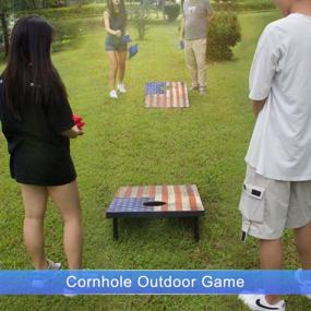img 1 attached to Cornhole Board Set - 8 Bean Bags, Handbag And 2 Regulation Size Solid Wood Corn Hole Boards With Vintage Flag Design For Lawn, Park Or Yard Toss Game