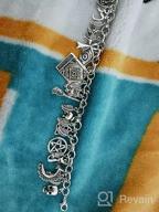 img 1 attached to 🐾 Mythical Fairytale Lucky Charm Bracelet with Celtic Cat, Cross, Moon Face, and Leaf Accents by RechicGu review by Bill Martinson