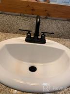 картинка 1 прикреплена к отзыву 2-Handle 4-Inch 3-Hole RV Sink Bathroom Faucet With Lift Rod Drain Stopper & Supply Hoses By WOWOW Black Centerset от Jeremy Marshall