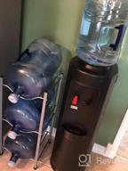 img 1 attached to LIANTRAL 5 Gallon Water Jug Holder Water Bottle Storage Rack, 4 Tiers, Black review by Dominic Kimbro