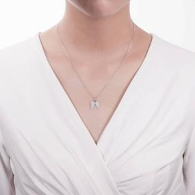 img 1 attached to Модное ожерелье с подвеской CZ с родиевым покрытием для женщин с дизайном ангельских крыльев BERRICLE из стерлингового серебра
