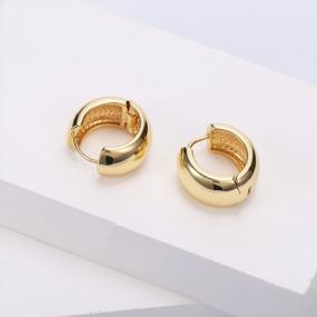 img 1 attached to Stylish And Chic Small Chunky Thick Hoop Earrings For Women And Men - Perfect Huggie Earrings In 14K Gold Plated Finish By FAMARINE