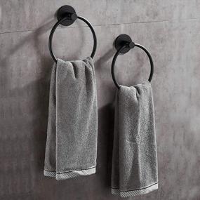 img 4 attached to Rustproof Adhesive Hand Towel Ring Set - Wall Mounted Stainless Steel Bathroom Towel Holder In Sleek Black Finish By GERUIKE (Pack Of 2)
